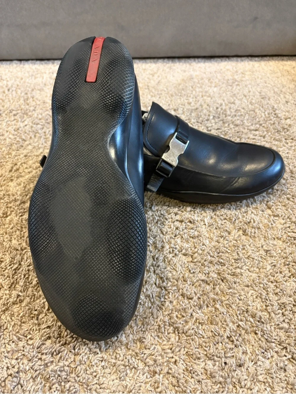 Prada Linea Rossa Black Leather Slip-On Loafers with Metal Buckle